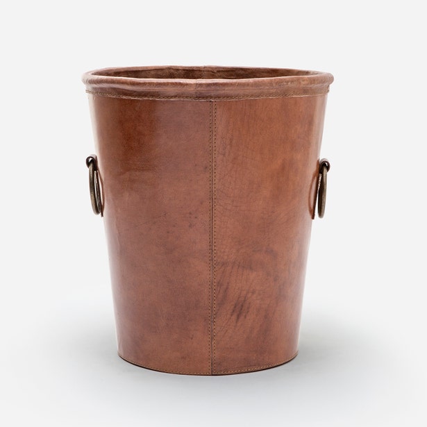 Pigeon & Poodle Ogden wastebasket in tan leather with bronze ring handles.