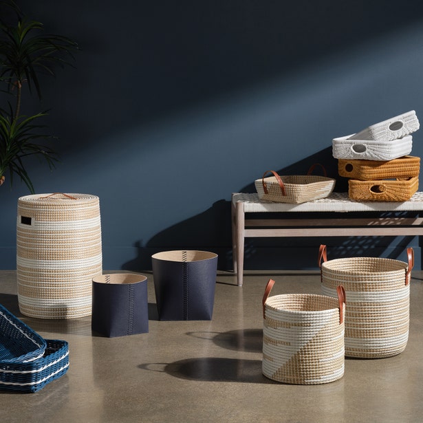 Pigeon & Poodle Olinda hamper set styled in a blue room with coordinating baskets.