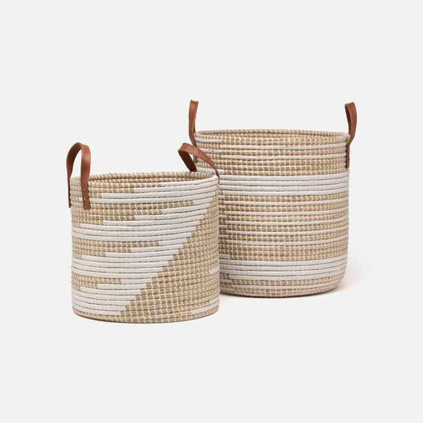 Two Pigeon & Poodle Olinda nesting hampers in natural and white weave with tan leather handles.