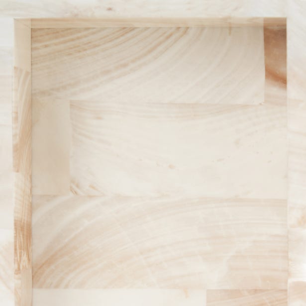 Close-up of Palermo II bath canister lid, cream and tan stone-look patchwork panels.