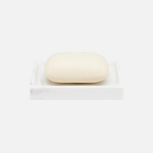 Pigeon & Poodle Parma soap dish in white marble with ivory bar soap, overhead view.
