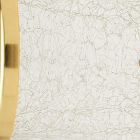 Close-up of crackled white and gold glass texture on Pomaria bath canister lid.