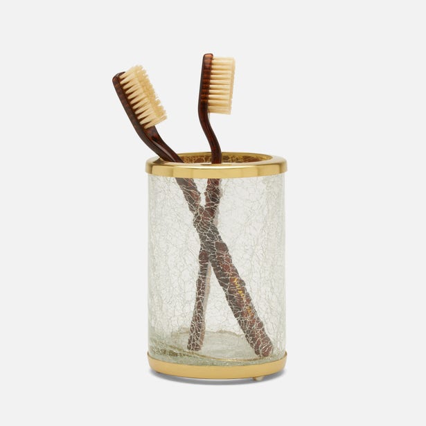 Pigeon & Poodle Pomaria brush holder in crackle glass with gold rim, two toothbrushes inside.