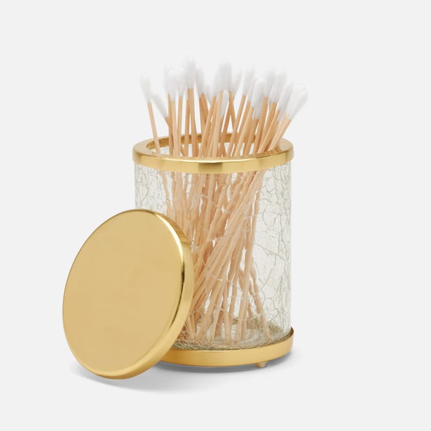 Pigeon & Poodle Pomaria bath canister in crackle glass with gold lid, filled with cotton swabs.
