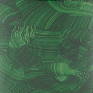 Close-up of malachite-inspired swirling green pattern on Porter hand towel tray surface.