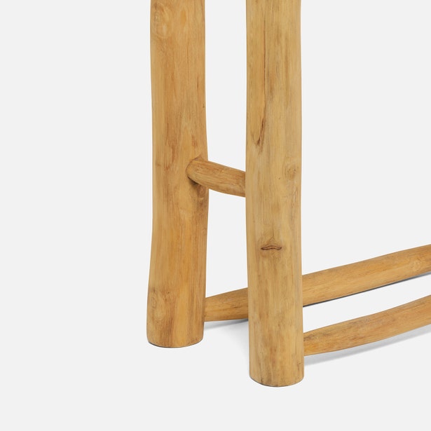 Close-up of Provo teak towel rack base showing natural wood grain and joinery.