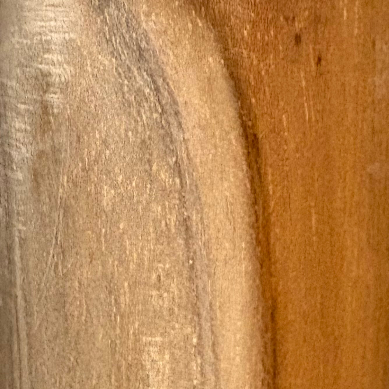 Close-up of warm honey teak wood grain detail on Provo freestanding towel rack.