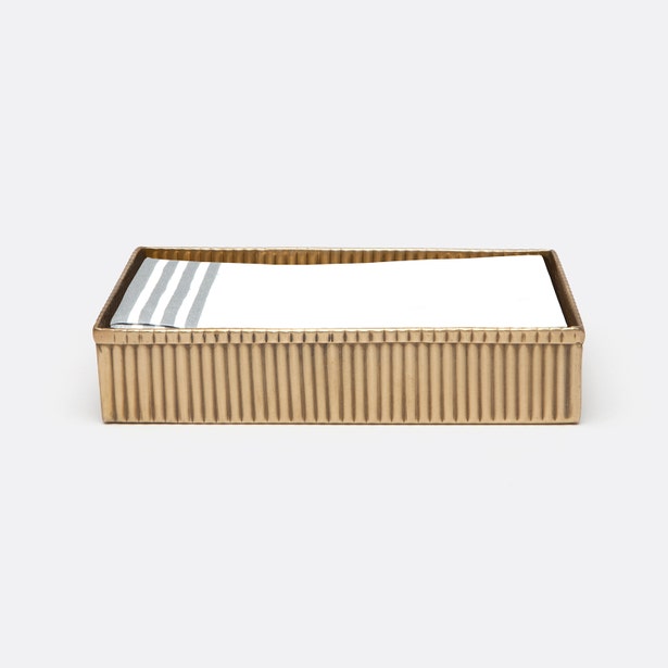 Pigeon & Poodle Redon hand towel tray in gold with ribbed sides, holding folded towels.
