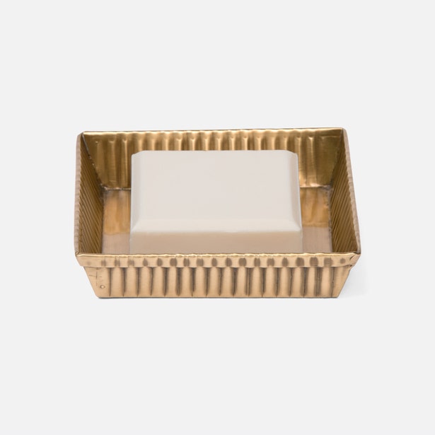 Pigeon & Poodle Redon soap dish in brushed gold with ribbed rectangular frame.
