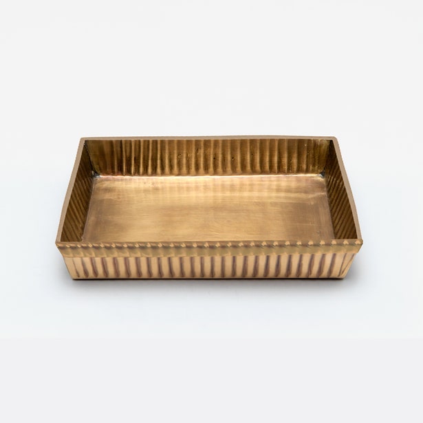 Pigeon & Poodle Redon soap dish in antique brass with ribbed exterior detail.