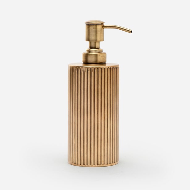 Pigeon & Poodle Redon soap pump in brass with vertical ridged detailing, side view.