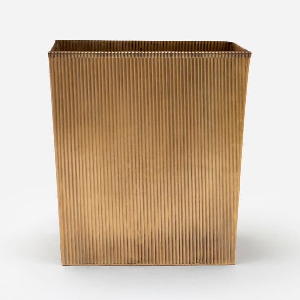Pigeon & Poodle Redon wastebasket in brushed brass with vertical ribbed texture.