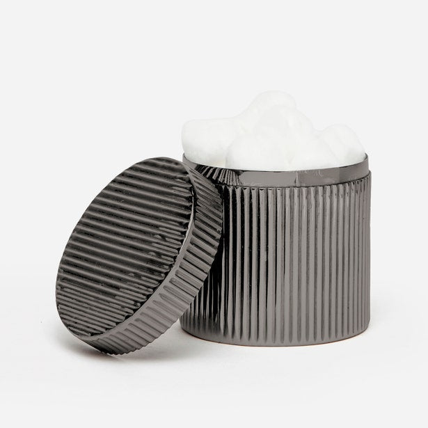 Pigeon & Poodle Redon bath canister open lid, ribbed gunmetal finish with white cotton balls inside.