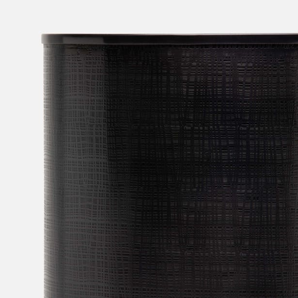 Close-up of Pigeon & Poodle Remy wastebasket in black with linen-textured surface detail.