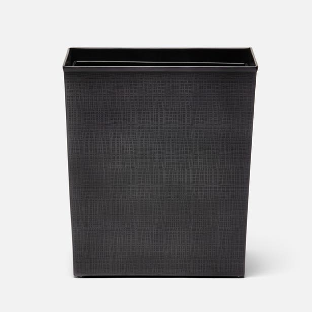 Pigeon & Poodle Remy wastebasket in black with linen-textured exterior, front view.