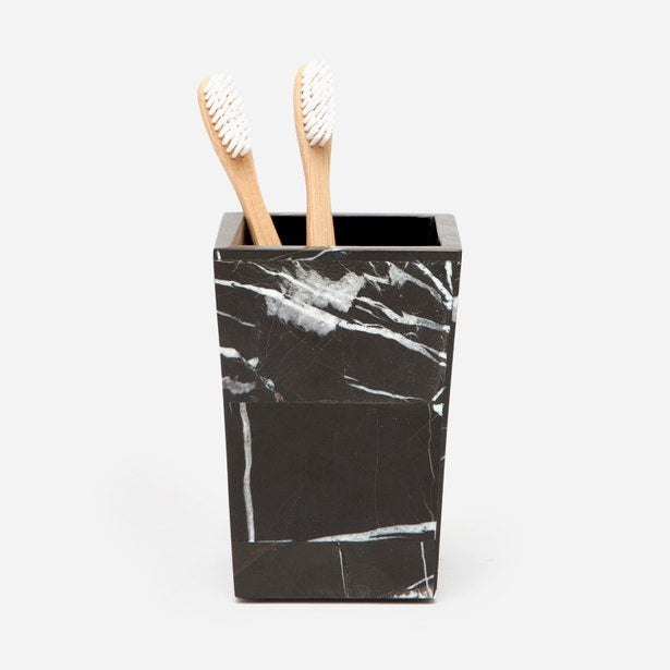 Pigeon & Poodle Rhodes brush holder in black marble with white veining, holding two bamboo toothbrushes.