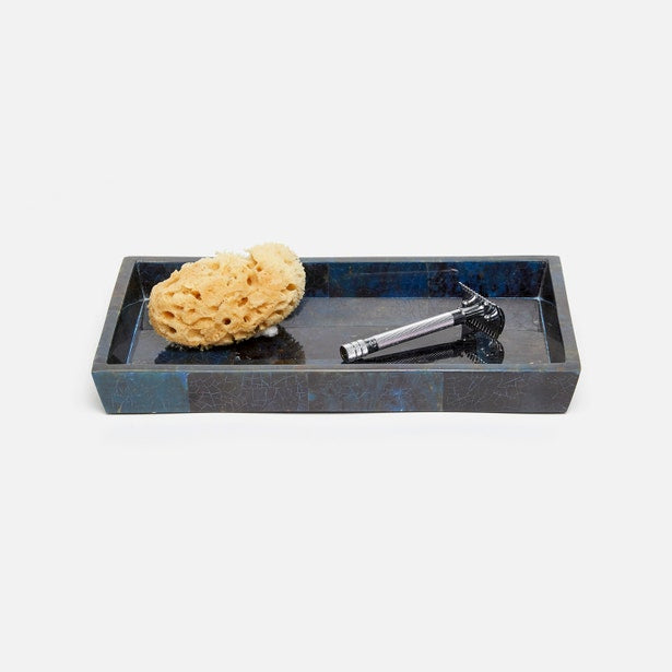 Pigeon & Poodle Santorini tray in deep blue resin, styled with a sea sponge and razor.