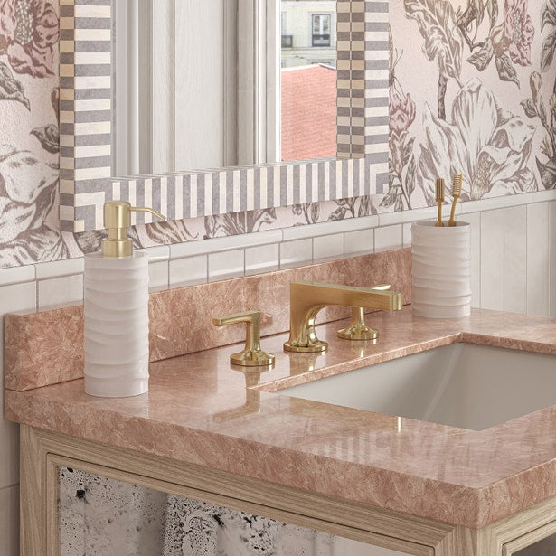 White ribbed Pigeon & Poodle Solin bath canister on pink marble vanity countertop.