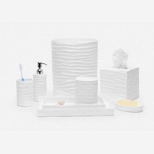 Pigeon & Poodle Solin white bath accessory set with wave-texture detailing, styled on white background.