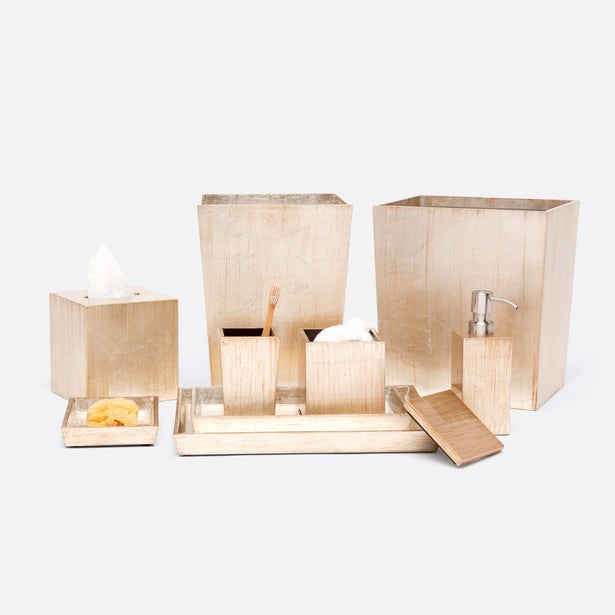 Tanlay bath accessory set in champagne lacquer, showing full collection grouping.