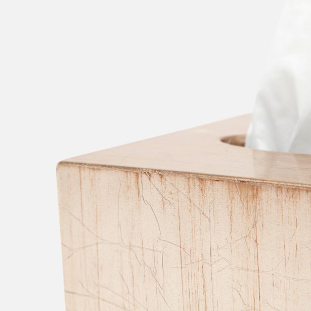 Close-up of Pigeon & Poodle Tanlay tissue box cover corner, crackle-glazed ivory ceramic finish.