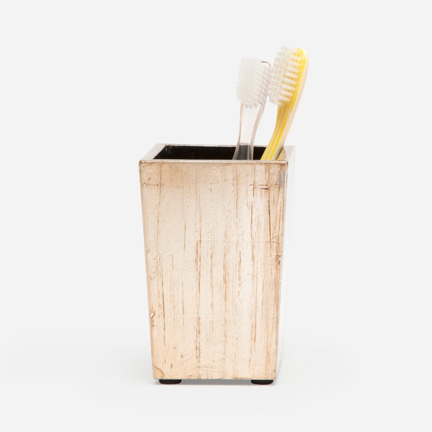 Pigeon & Poodle Tanlay brush holder in ivory resin holding two toothbrushes.
