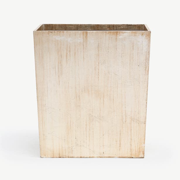 Pigeon & Poodle Tanlay wastebasket, ivory lacquered wood with vertical grain detail.