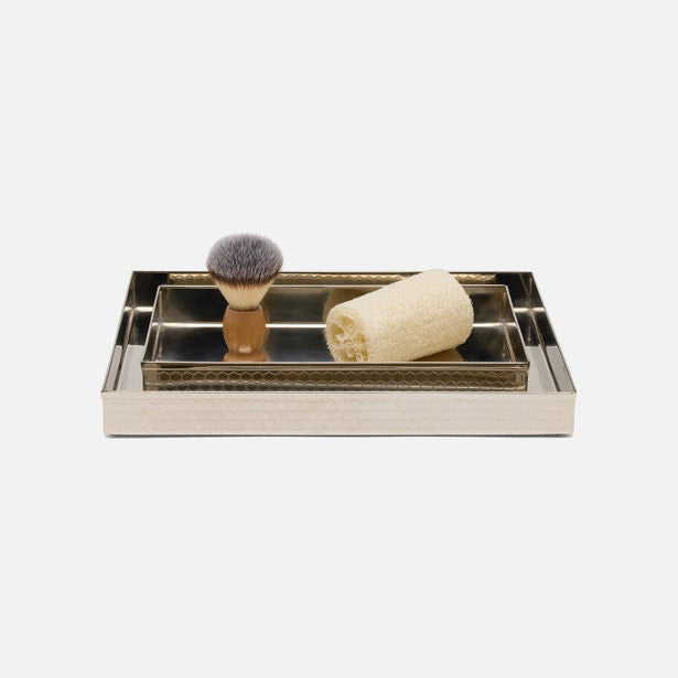 Pigeon & Poodle Temara trays styled with shaving brush and loofah on light background.