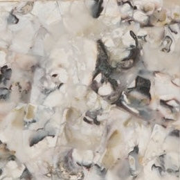 Close-up of Tramore soap dish surface in ivory and charcoal marbled stone pattern.