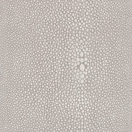 Close-up of taupe shagreen-textured surface with raised pebble pattern detail.