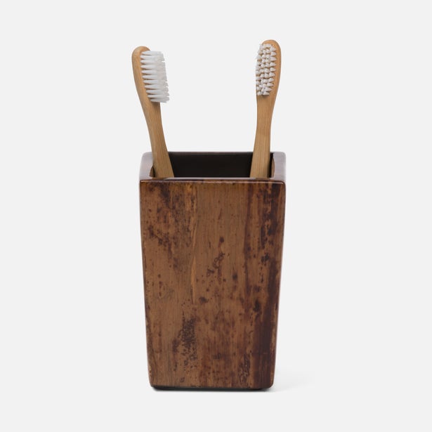 Pigeon & Poodle Varadero brush holder in distressed dark wood with two bamboo toothbrushes.