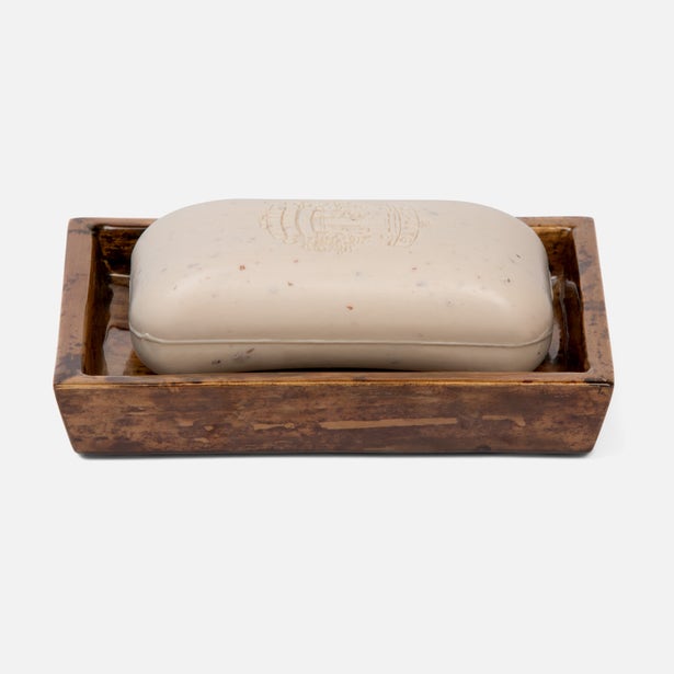 Pigeon & Poodle Varadero soap dish in tortoise resin holding an ivory bar soap.