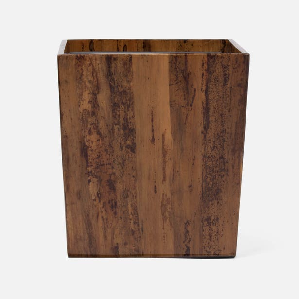 Pigeon & Poodle Varadero wastebasket in warm brown marbled resin, angled view.