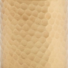 Close-up of honeycomb-textured champagne ceramic surface on Verum bath canister.