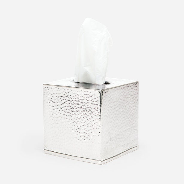 Hammered silver finish detail on Verum square tissue box cover with tissue pulled through top.