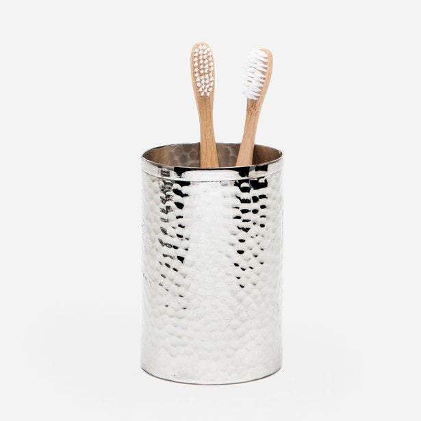 Pigeon & Poodle Verum brush holder in polished silver with hammered texture, holding two toothbrushes.