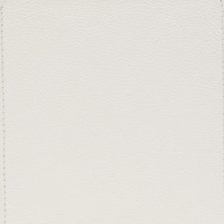 Close-up of ivory textured surface with subtle stitched edge detail on Victoria soap pump.