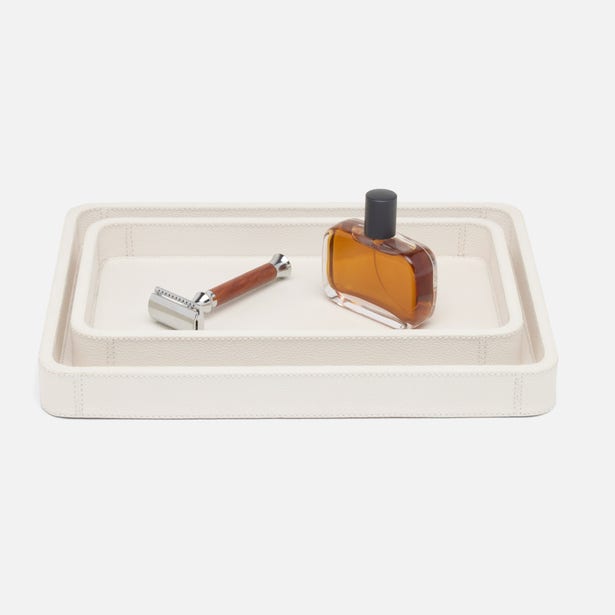 Pigeon & Poodle Victoria ivory textured tray styled with razor and cologne bottle.