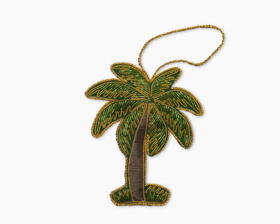 Henry Handwork beaded palm tree ornament in green and gold with hanging cord.