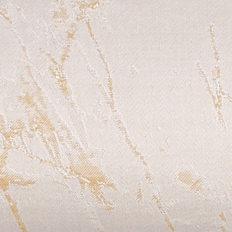 Close-up of ivory jacquard fabric with gold branch motif weave detail.