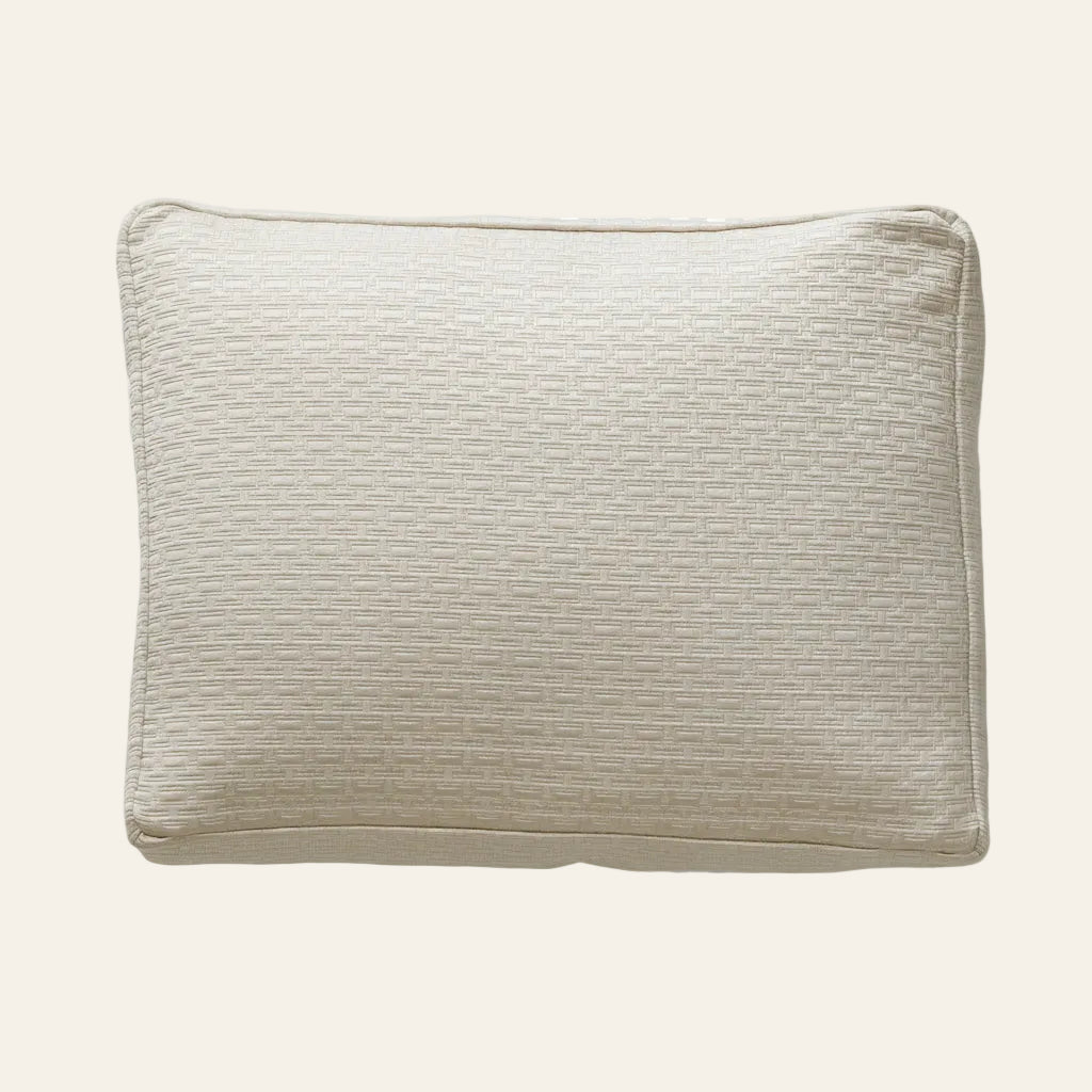 Ann Gish Pavilion ivory woven-texture box pillow with self-piped trim.