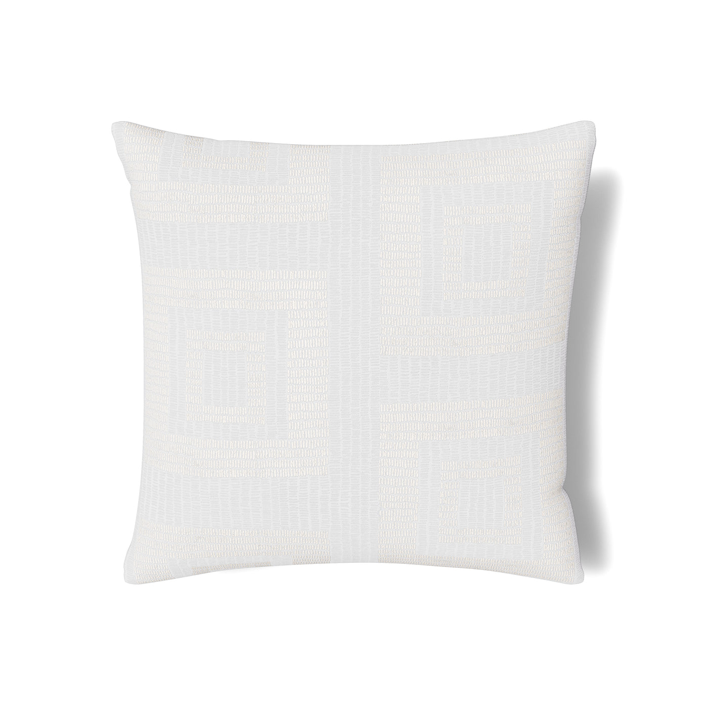 Close-up of Ann Gish Piastrella sham in ivory with subtle woven grid texture.
