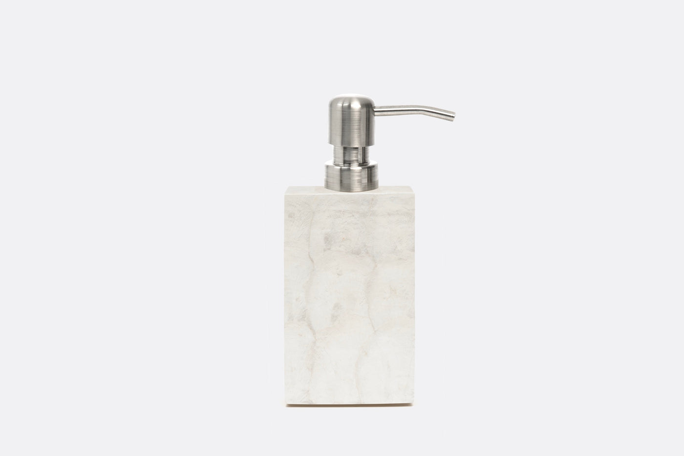 White marble soap pump with brushed nickel dispenser head, square profile, on neutral background.