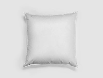 Ogallala Comfort Hypodown throw pillow insert in white with piped edge trim.