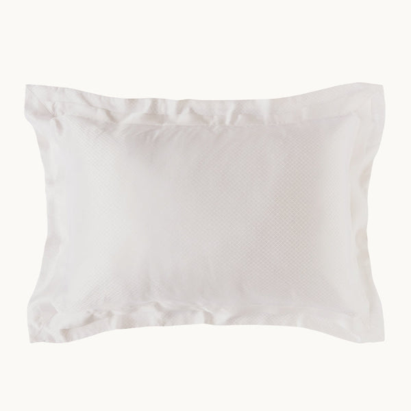 Photo of the Eva White Silk Pillowcase ensemble.