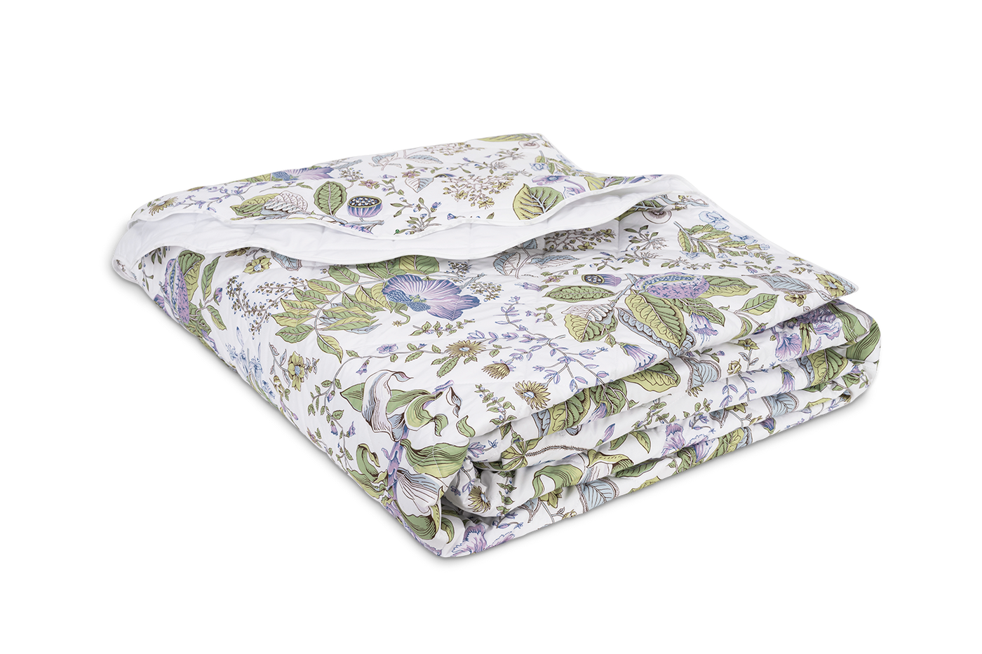 Matouk Pomegranate Schumacher quilt folded, white with green and lavender botanical print.