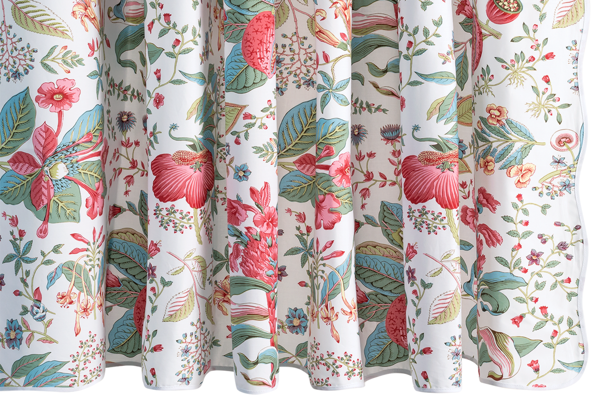 Close-up of Matouk Pomegranate shower curtain botanical print in coral, teal, and green.