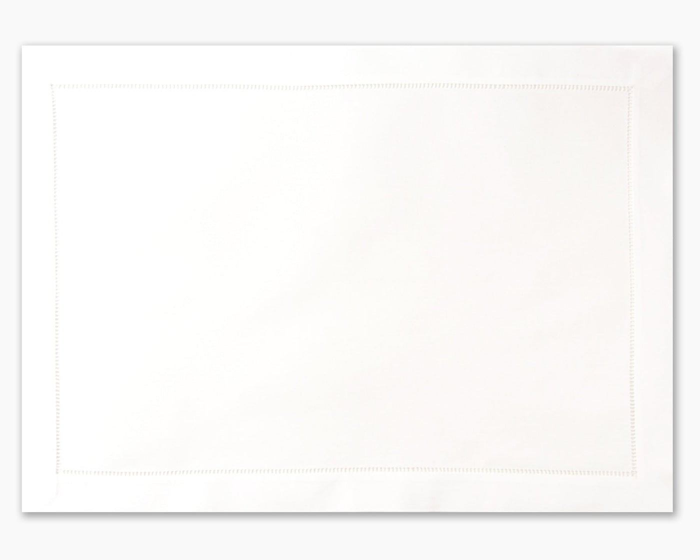Henry Handwork Pure Cotton white placemat with hemstitched border detail.