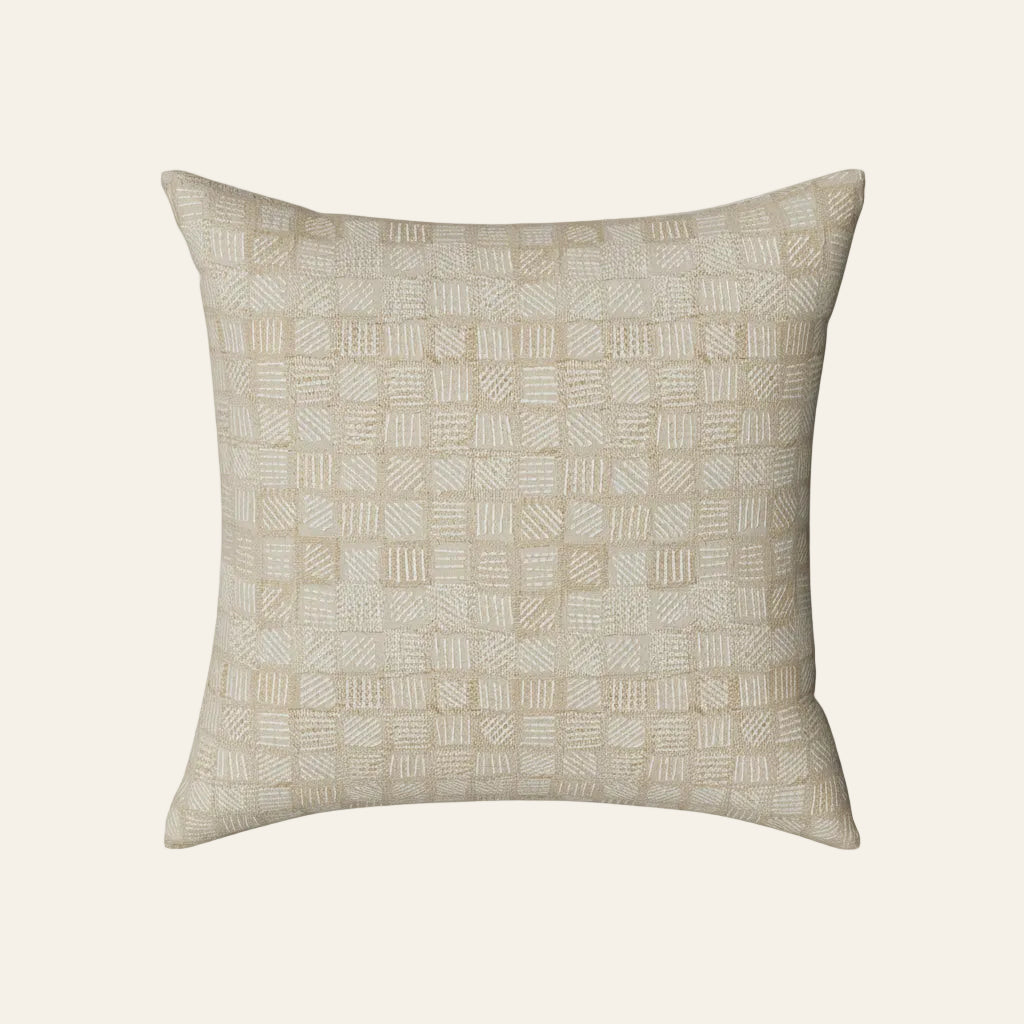 Ann Gish Qasaba pillow in ivory with woven grid pattern detail.