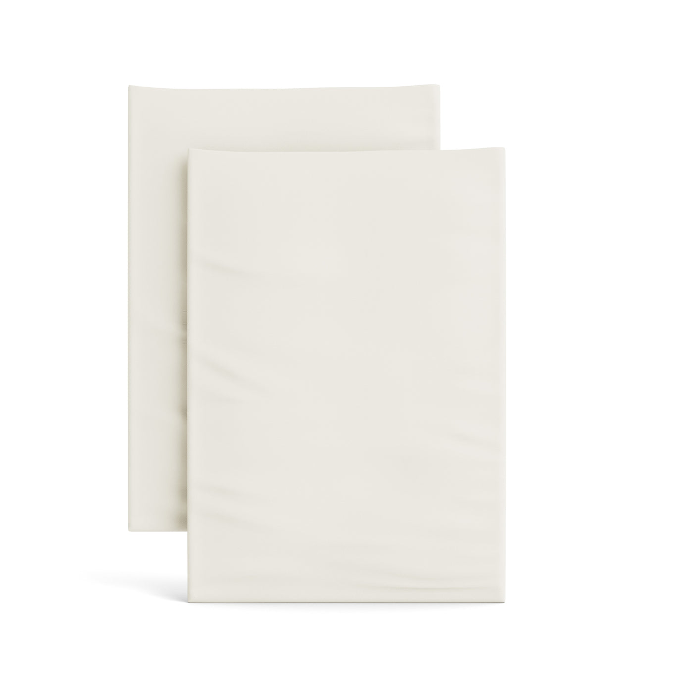 Two ivory Ann Gish Ready-to-Bed 2.0 pillowcases folded flat, stacked slightly offset.